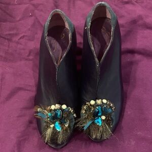 Elegant Black Ankle Boots with Feather Detail